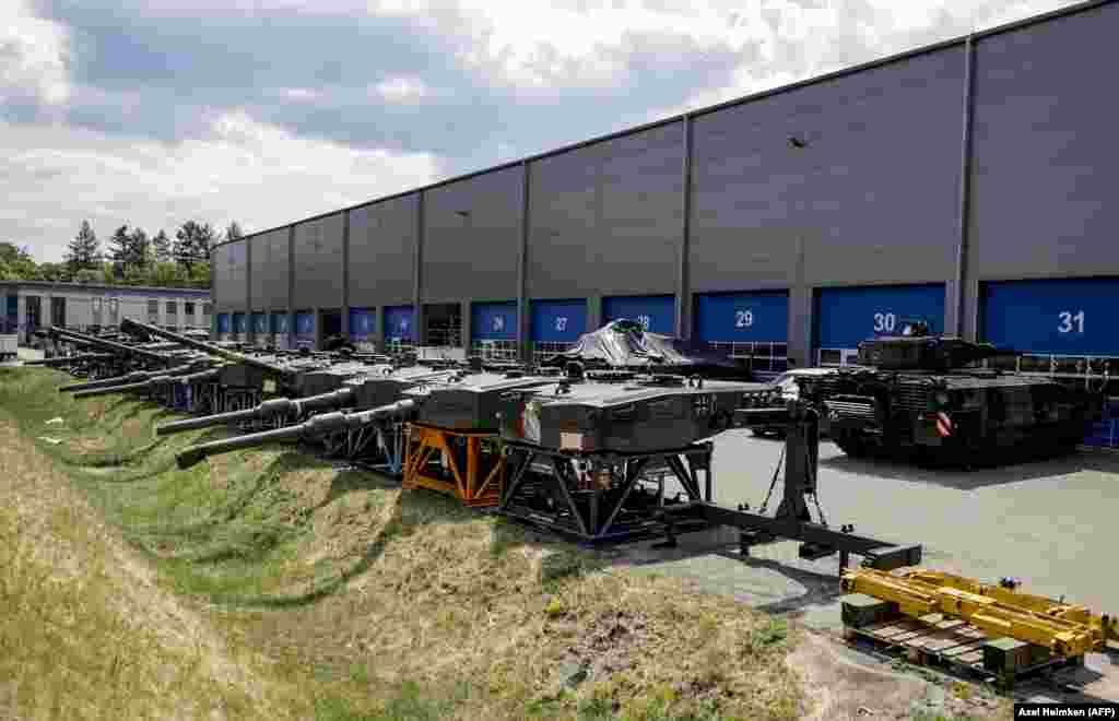 Tank turrets lined up outside the Rheinmetall facility.&nbsp; The German weapons company has added some 2,000 jobs since the Russian invasion, and been added to&nbsp;Frankfurt&#39;s blue-chip DAX stock index.