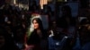 Protesters rally outside the Iranian Embassy in Istanbul on September 29, 2022. 