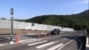 Armenia - A new wall and road built in the village of Kirants after the handover of adjacent land to Azerbaijan, August 20, 2024.