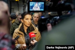 Marinika Tepic speaks during a protest outside the electoral commission building in Belgrade on December 19.