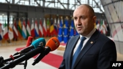 Bulgarian President Rumen Radev speaks on arrival for an EU summit at EU headquarters in Brussels on March 23.