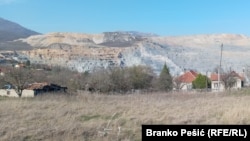 Residents in villages around Bor have repeatedly protested over poor air quality and damage to their homes, visible here near the mine’s open pit in 2024.