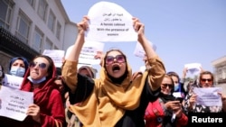 Afghan women's rights activists protest against the Taliban regime in Kabul in September 2021.
