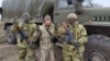Лидер движения "РУСОВ" Андрей Родионов (в центре) и двое сербских наемников, известных под позывными "Дунай" и "Сава", на оккупированных территориях Украины