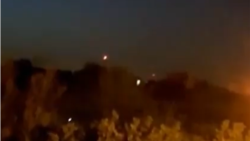 A social media video reportedly captures explosions near a military base in Iran believed to be Isfahan. Iranian news agency Fars said the flashes were antiaircraft guns working at very low altitude and that no air-defense missiles were launched.