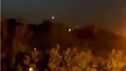 A social media video reportedly captures explosions near a military base in Iran believed to be Isfahan. Iranian news agency Fars said the flashes were antiaircraft guns working at very low altitude and that no air-defense missiles were launched.