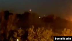 A social media video reportedly captures explosions near a military base in Iran believed to be Isfahan. Iranian news agency Fars said the flashes were antiaircraft guns working at very low altitude and that no air-defense missiles were launched.