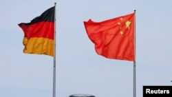 Arestările au loc la o săptămână de la vizita cancelarului german Olaf Scholz în China.