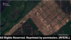 Село Кринки, Херсонська область. Супутниковий знімок Planet Labs села до підриву Каховської ГЕС. 5 червня 2023 року