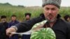 RUSSIA -- A Cossack slashes a watermelon with a sabre during a sabre-cutting competition in the village of Novosvetlovsky, Rostov region, on August 27, 2023.