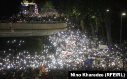 Protesters gather at Tbilisi's Heros' Square on May 14.