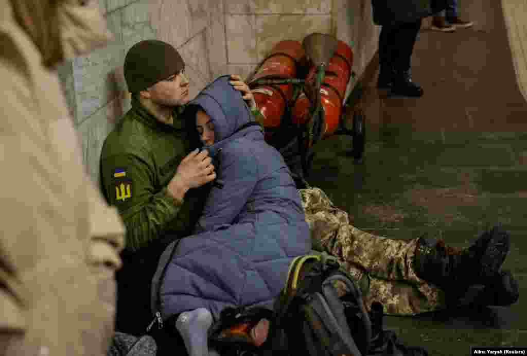 As air-raid sirens sounded across the capital, civilians sought shelter in Kyiv&#39;s subway stations.