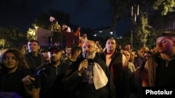 Armenia - Archbishop Bagrat Galstanian addresses supporters near the parliament building, Yerevan, June 9, 2024.