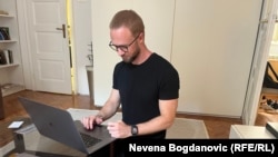 Belarusian journalist and activist Andrey Hnyot on June 14 in the rented Belgrade apartment where he is under house arrest pending a decision on his possible extradition to Belarus.