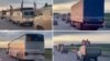 Russia - convoy of trucks and military vehicles, some of them with p.m.c. wagner flags on a highway in southern russia. undated