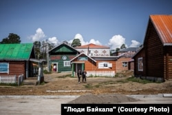 Wooden buildings on the main street of Dadal.