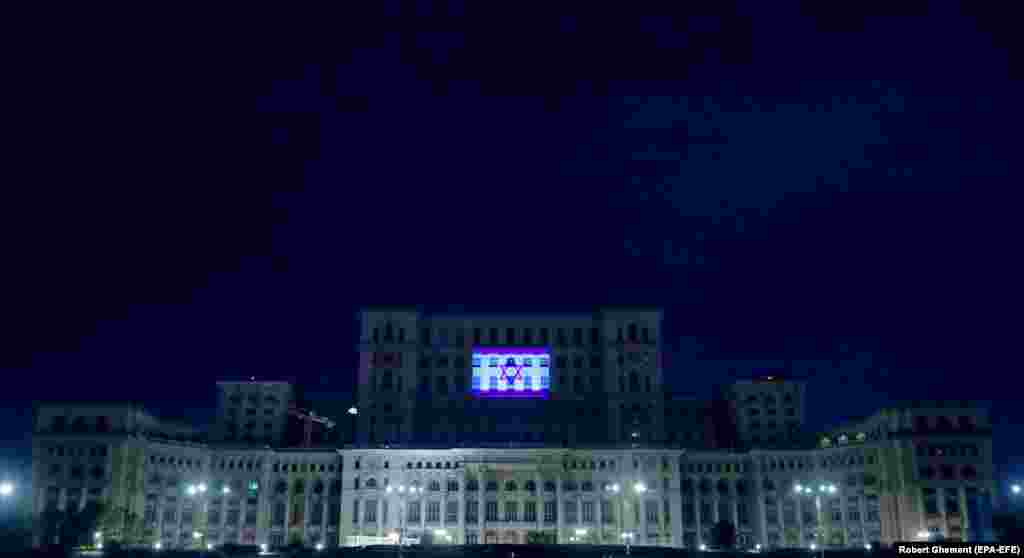 The Israeli flag projected onto Romania&#39;s Palace of the Parliament, in Bucharest on October 9.&nbsp;