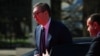 Serbian President Aleksandar Vucic walks out of a car on the day of the Ukraine Southeast Europe Summit in Tirana on February 28.