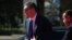 Serbian President Aleksandar Vucic walks out of a car on the day of the Ukraine Southeast Europe Summit in Tirana on February 28.