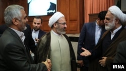 غلامحسین محسنی اژه‌ای (راست) و محمد مصدق کهنمویی (وسط)