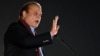 Pakistani ex-Prime Minister Nawaz Sharif addresses supporters during an event held to welcome him in Lahore in October 2023.