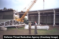 Ukrainian soldiers seen during an "inspection team visit" to a WMD production site in 1995