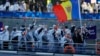 Sportivi din R. Moldova la bordul unei bărci pe Sena, în timpul ceremoniei de deschidere a Jocurilor Olimpice Paris 2024, pe 26 iulie. Portdrapel au fost arcașii Dan Olaru și Alexandra Mîrca.