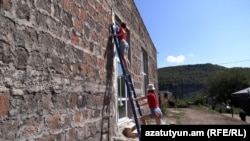 Dutch volunteers help build an educational and rehabilitation center for children with special needs in the village of Vahagni, Lori Province, Armenia.