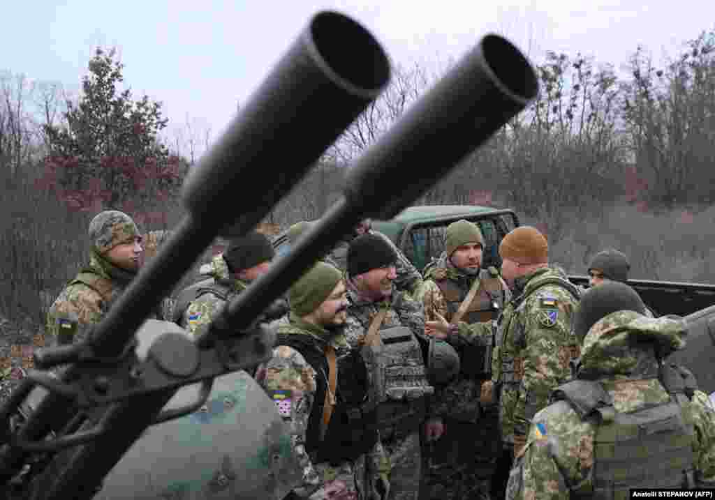 Serhiy Nayev (third from right), the commander of Ukraine&#39;s joint forces, congratulates soldiers of a mobile air defense unit on January 3 who took part in defense operations during the January 2 Russian missile and drone attack on Kyiv.