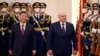 Belarusian autocrat Alyaksandr Lukashenka walks with Chinese leader Xi Jinping in the Great Hall of the People in Beijing on March 1.