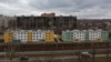 Росія споруджує нові будинки на місці розбомблених під час штурму Маріуполя, 15 лютого 2023 року