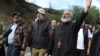 Archbishop Bagrat Galstanian leads a group of protesters who oppose border changes on a march toward Yerevan, with a target date of May 9 to reach the Armenian capital.
