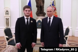 Russian President Vladimir Putin and Akhmat Kadyrov at the Kremlin in March.