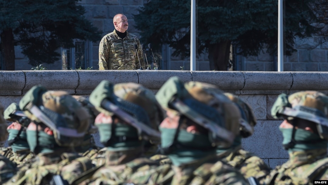 Azerbaijani President Ilham Aliyev presides over a military parade in the former capital of the Nagorno-Karabakh region known to Armenians as Stepanakert and in Azeri as Khankendi, on November 8. 
