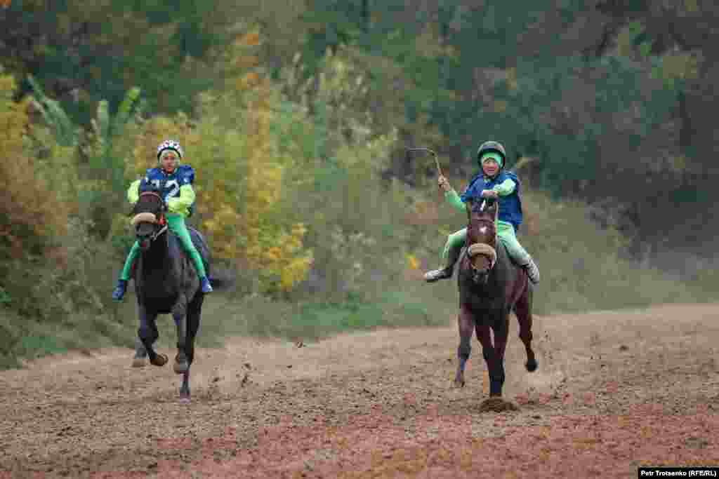 Young competitors race to reach the finish line first.