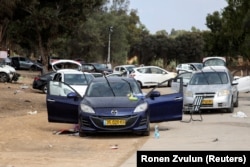 Автомобили убитых участников рейв-фестиваля в кибуце Реим