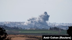 Дым над сектором Газа после очередной изаильской бомбардировки. Вид со стороны Израиля. 15 октября 2023 года