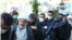 افراد گروه موسوم به «گردان‌های اشتر» در محل دفن قاسم سلیمانی