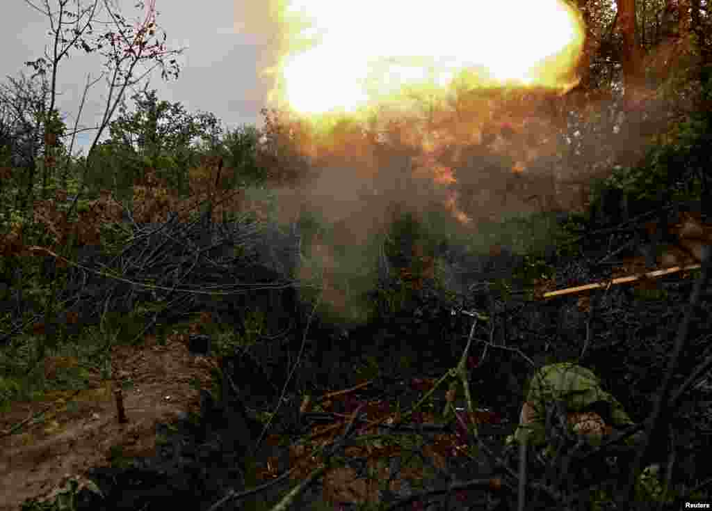 A Ukrainian soldier fires a mortar toward Russian positions. Ukrainian troops have been attempting to reach the city of Melitopol to cut off a land bridge that links Russian-occupied territory in the east to the Crimean Peninsula, which was illegally annexed by Moscow in 2014.