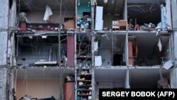 Stambena zgrada u Harkivu teško oštećena u ruskom raketnom napadu, 23. januar 2024.