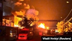 Požar izazvan ruskim napadom dronom na zgradu u Harkivu, 4. maj 2024