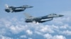 Avionët F-16 të Forcës Ajrore të Holandës duke fluturuar gjatë një demonstrimi, më 4 korrik, 2023.