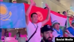 Central Asian fans display their flags together at the Paris Olympics.