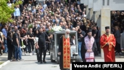 The funeral in Belgrade of security guard Dragan Vlahovic, who was killed in a shooting attack on an elementary school earlier this week. 