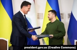 Mark Rutte și Volodimir Zelenski, la Harkov, 1 martie 2024.