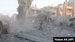 شهر غزه که در نتیجه بمباران اسرائیل به ویرانه مبدل شده است 