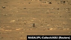 تصویری از بالگرد نبوغ بر سطح مریخ