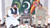 Pakistani Army chief General Asim Munir (right) meets with Amir Khan Muttaqi, the interim foreign minister for the Taliban-led government in Afghanistan, in Rawalpindi, Pakistan, on May 6.
