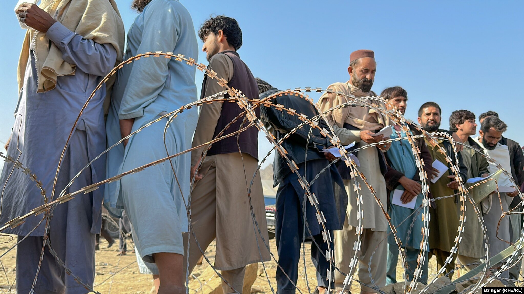 Afghans wait to be processed. The immediate need for many is to find housing ahead of the harsh winter months in Afghanistan, a mountainous country where temperatures can drop to as low as minus 35 degrees Celsius.