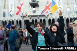 Olya is on the left.